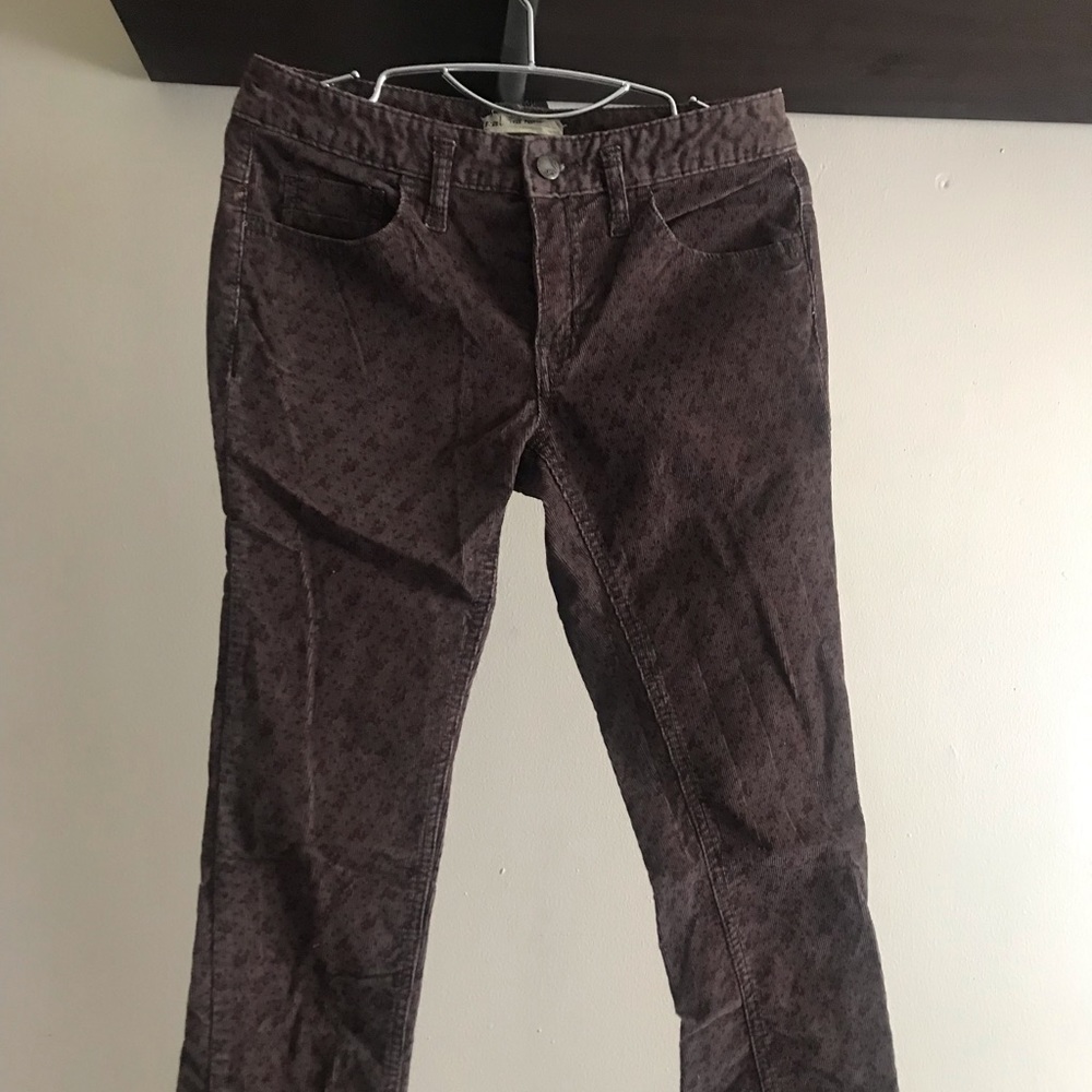 Free People corduroy pants with small flowers.